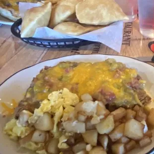 Chicken fried steak didn't need its own plate because I was able to fit what looks like 1 egg and some potatoes on it.