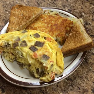 Greek omelette with hash browns and toast