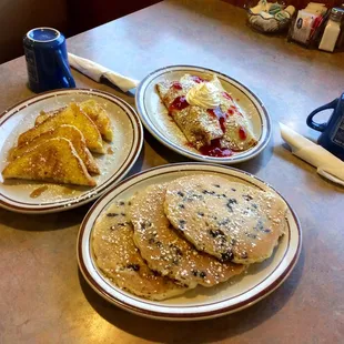 Chocolate chip pancakes french toast and strawberry Swedish pancakes
