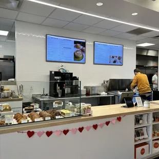 a woman working in a bakery
