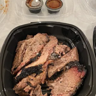 Really good brisket. Deep smoke ring. Moist and springy.