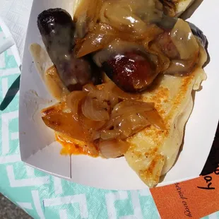 Pierogi, sauteed onions, sausage.