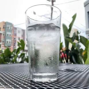 a glass of water on a table