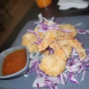 a plate of deep fried shrimp