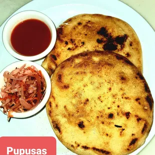 two flatbreads on a plate