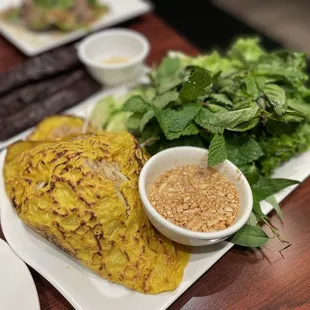 60. Banh Cheo and Cambodian beef jerky in the back