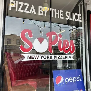 a pizza by the slice window