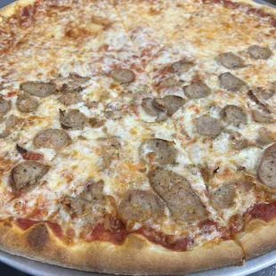 a sausage and cheese pizza
