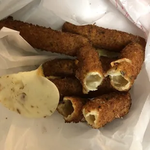 Mozzarella sticks FAIL; hard, hollow, severely overcooked and all the cheese came out and stuck to the wax paper. Really disappointing.