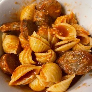 a bowl of pasta and meatballs