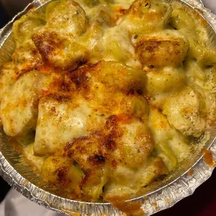 Tortellini with chicken comes with a side salad and garlic bread.