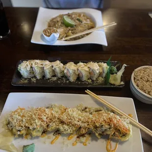 a plate of sushi and a plate of rice