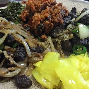 Derek tibs (left), cabbage, Goden tibs (right), Qwanta Fir-Fir (top), collared greens
