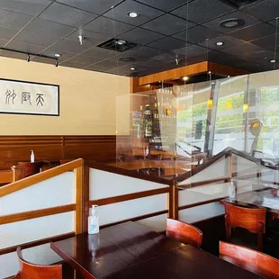 Dining area with partitions at every table (during COVID-19 pandemic)