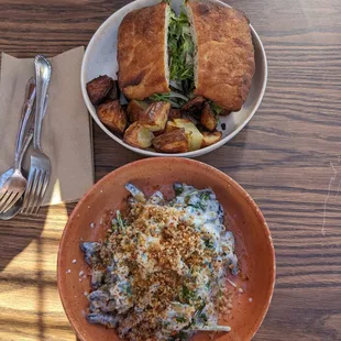 Eggplant paneer sandwich with roasted potatoes and squid ink pasta
