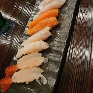 Bottom to top: ama ebi, mirugai, coho, madai