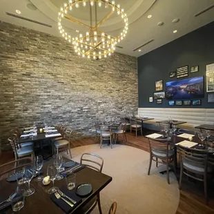 a dining room with tables and chairs