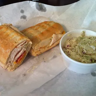 Chicken panini with bacon, cheddar and parm mayo with a side of potato salad