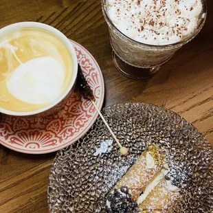 a plate of food and a cup of coffee