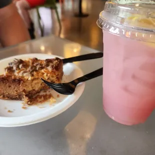 a plate of food and a drink on a table