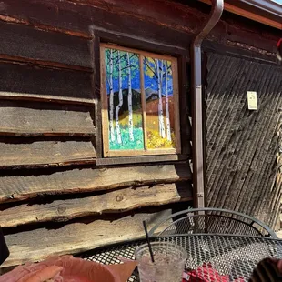 Back patio with painted glass windows