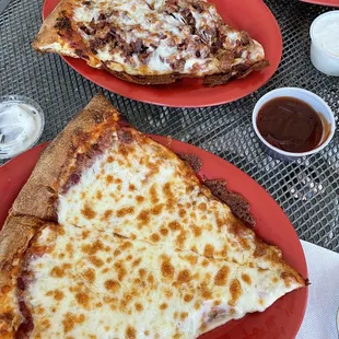 Cheese pizza and sausage and bacon pizza slice