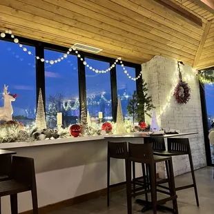 a bar with christmas decorations