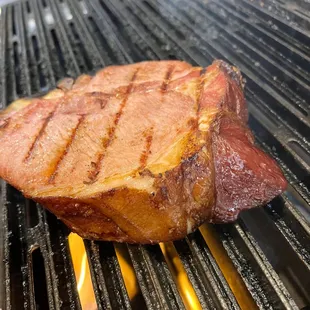a steak on the grill