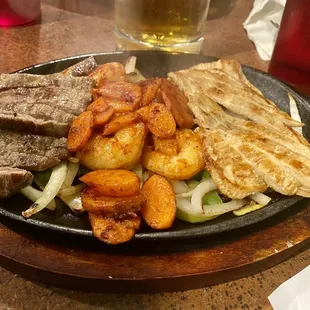 Sampler fajitas - asada, shrimp and chicken