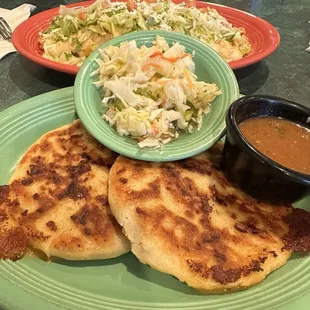 Chicken &amp; pork papusa and burrito de relleno.