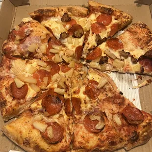 Less cheese and sauce! More pizza bread! Pepperoni , sausage with pineapple, the other half with pepperoni. Canadian bacon, and pineapple.