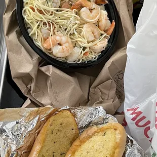 Shrimp scampi with lot s of shrimp! Comes with big garlic bread, or salad.