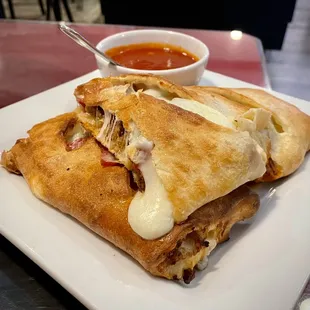 Stromboli with pepperoni, ham, and Italian sausage