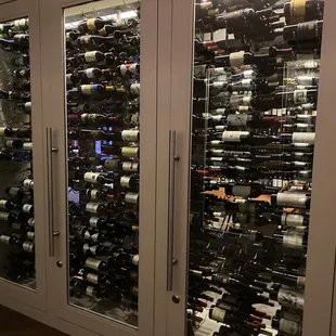 Entrance to the dining room. Wine cases line both walls.