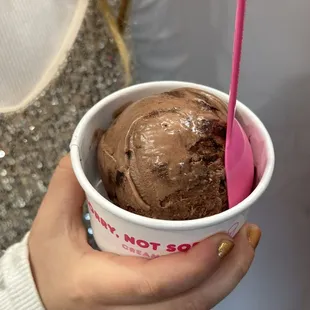  woman holding a cup of ice cream
