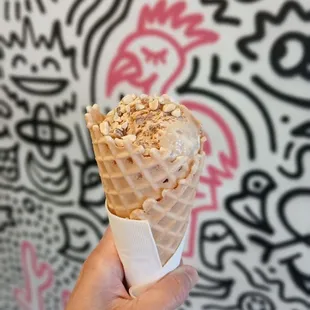 Kids scoop of coffee &amp; donuts in a waffle cone