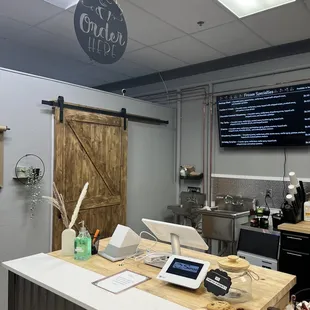 a counter with a tablet on it