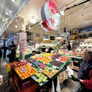 people shopping in a grocery store