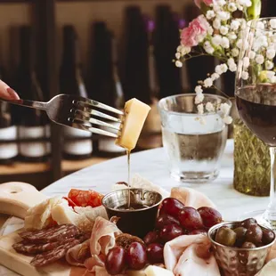 a plate of meat and cheese