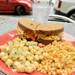 Poulet Curry Sandwich with couscous and chickpea salads.