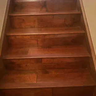 a wooden staircase in a home