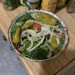 Mediterranean Salad w onions, vinaigrette on the side.  I added pepperoncini peppers cause I like them on salads, and for aesthetics.