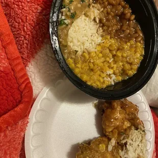 Chicken rice with gravy baked beans and cream corn