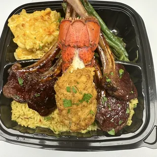 Fried lobster, jerk lamb, with mac &amp; cheese, yellow rice &amp; green veggies