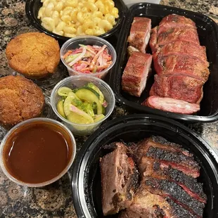 The spread- cornbread, mac n cheese, rib tips, brisket, pickles, collard greens, and house bbq sauce