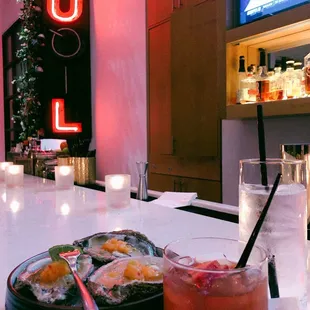 Oyster trio $14 (+add oyster $4/each) and london calling cocktail
