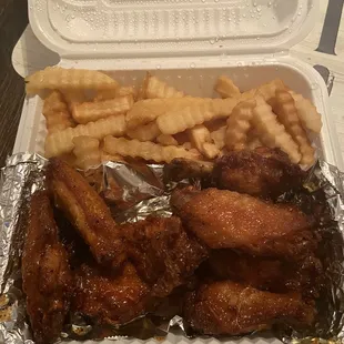 Honey lemon pepper wings w side of French fries.