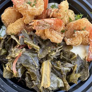 a bowl of fried shrimp and greens