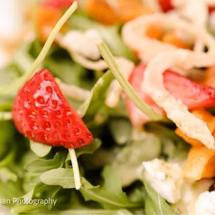 a closeup of a plate of salad