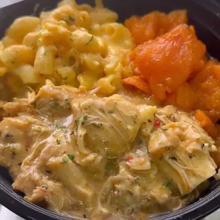 Soul bowl with lemon garlic chicken over soul rice or mashed potatoes, mac &amp; cheese, and candied yams.